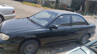 015 satışı: Kia Sephia: 1.6 l | 1997 il Sedan — 4