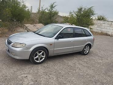 e53 amg: Mazda 323: 2003 г., 1.5 л, Механика, Универсал — 10