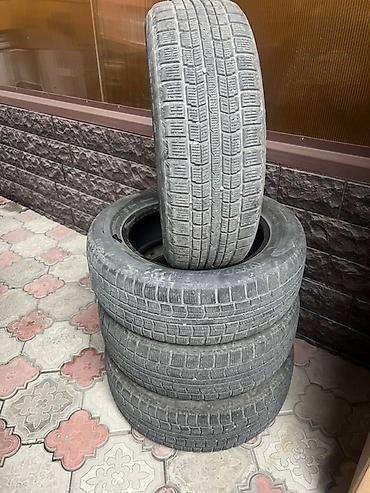 Шины: Комплект зимних шин 235/60 R18. На фото — 4 автомобильные шины — 1