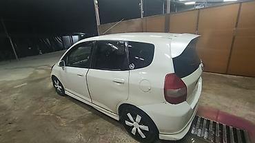чехлы бу: Honda Fit: 2002 г., 1.3 л, Вариатор, Бензин, Хэтчбэк — 7