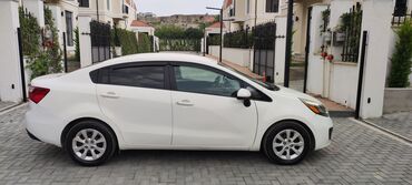 Kia Rio: 1.6 л | 2014 г. Седан