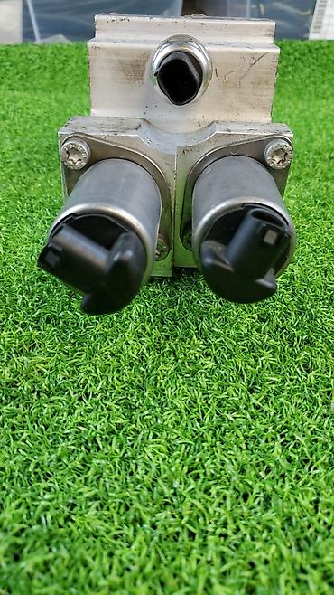 Другие автозапчасти: Блок клапанов гидроподвески (Dynamik Drive) для БМВ X5 Е70 ​6782—737 — 3