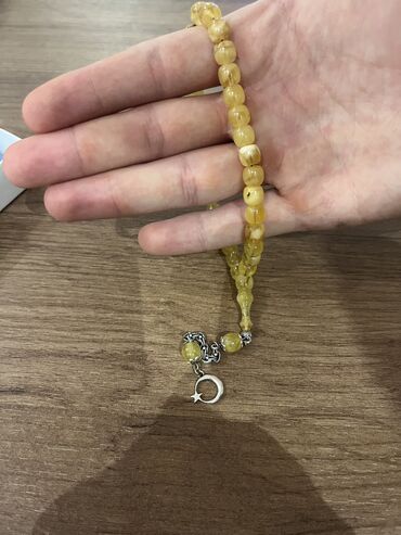 Təsbehlər: Damla (gülabi) Rus Kaliningrad Kəhraba.Gümüş aypara imamə ilə.Bilək
