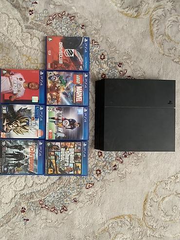 PlayStation 4 (третья ревизия, “fat”) + комплект дисков 408 гб