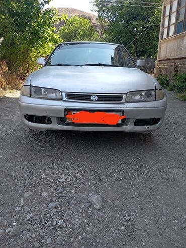 авто пуск: Mazda Cronos: 1994 г., 2 л, Механика, Бензин, Седан