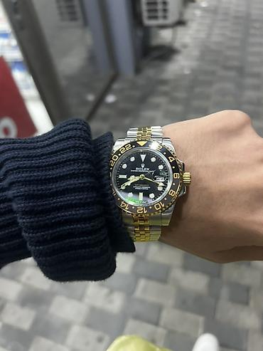 luc saati: Rolex GMT-Master II (ikili rəngli Jubilee qolbaqlı) - Korpus — 1