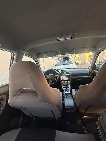 kovş: Subaru Impreza: 2 l | 2007 il 301000 km Sedan — 10
