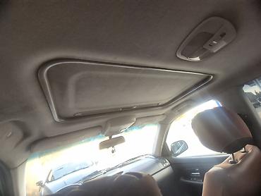 paneler: SsangYong Rexton, qara rəng, 5 qapılı SUV. Texniki və dizayn — 8