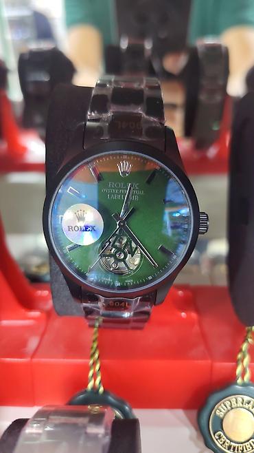 3d saat: Məhsul: Kvars mexanizmlə işləyən analoq qol saatları (Oyster Perpetual — 1