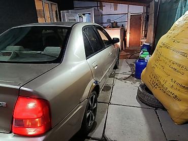 protege: Mazda 323: 1999 г., 1.5 л, Автомат, Бензин, Седан — 1