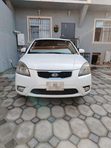 hybrid avtomobillər qiymətləri: Kia Rio: 1.4 л | 2011 г. Седан