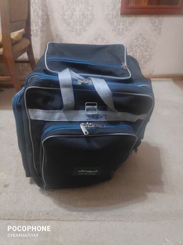 синяя сумка: Рюкзак . Вместительный 50/30см . Три кармана . Пользовались один раз