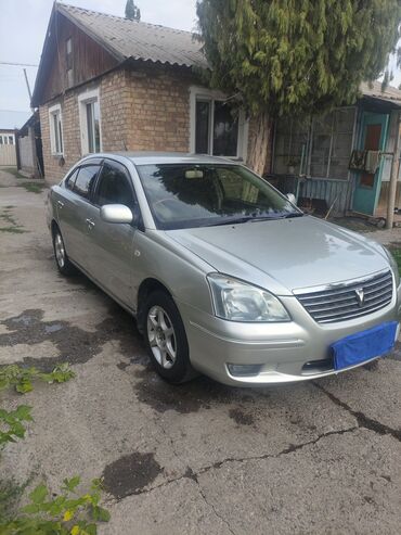 Другие автомобили: Серебристый седан Toyota Premio. Автомобиль оснащен четырьмя дверями — 8