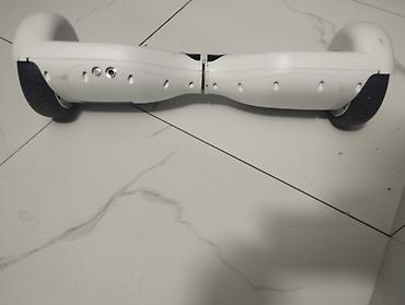 velosiped telefon tutacağı: Öz-özünə tarazlanan elektrikli hoverboard (iki təkərli skuter) — 1