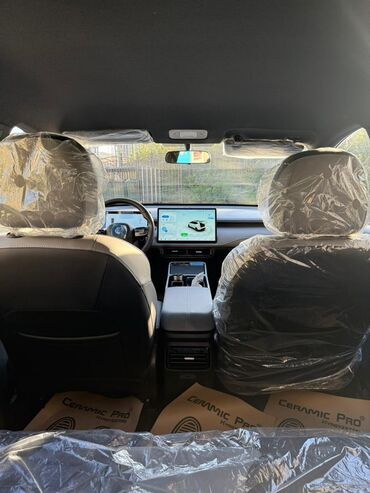 Другой электротранспорт: Электромобиль (кросс‑минивэн) белого цвета. Основные особенности: - — 11