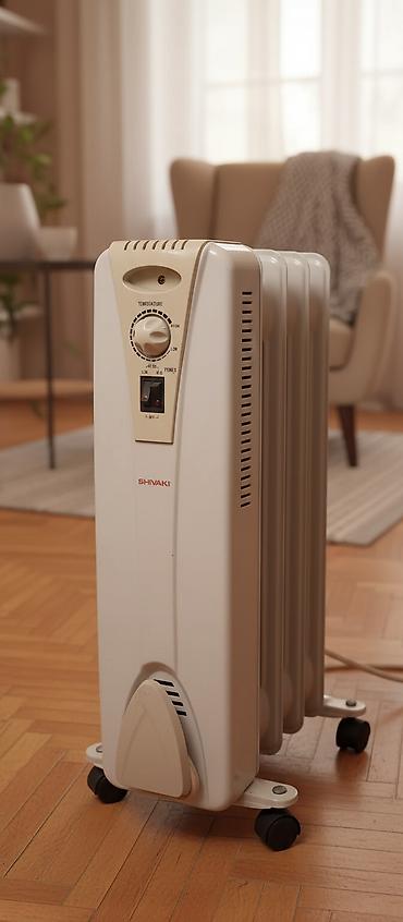 seksiya: Shivaki radiator 9 seksiyalı.yaxşı vəziyyətdə .çox yaxşı — 1