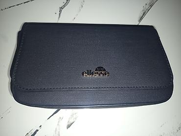 Ellesse crossbody torbica – crna - Kompaktna, elegantna torbica sa