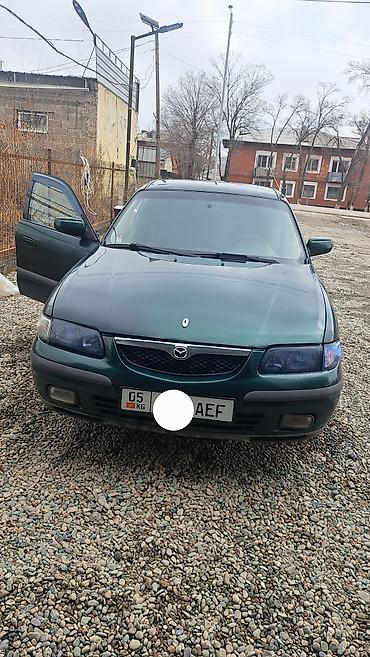 385 55: Mazda 626: 1997 г., Механика, Бензин, Седан — 1
