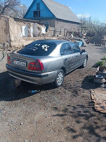 мотор митсубиси каризма: Mitsubishi Carisma: 2003 г., Седан — 2