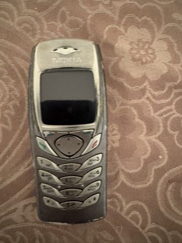 Nokia: Nokia 1, rəng - Boz, Düyməli