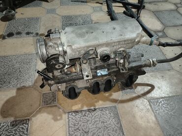 Панели, обшивки: - МКПП (механическая коробка передач) в сборе с кулисой/приводом — 6