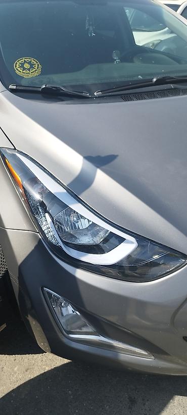opel mühərriki: Hyundai Elantra sedan – gümüşü rəng. - Xarici: LED gündüz işıqları — 1