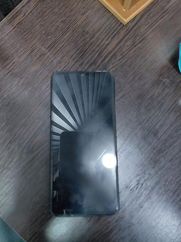 redmi qulaqciq: Xiaomi Redmi (A seriyası) smartfon - Rəng: qara, mat teksturalı arxa — 3