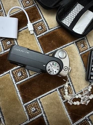 nikon: Компактная фотокамера Nikon Coolpix P50 - Матрица 8.1 Мп. - Объектив — 2