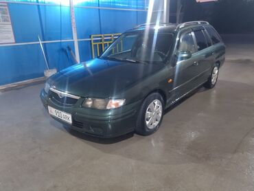 акумулятор машины: Mazda Capella: 1999 г., 1.8 л, Механика, Бензин, Универсал