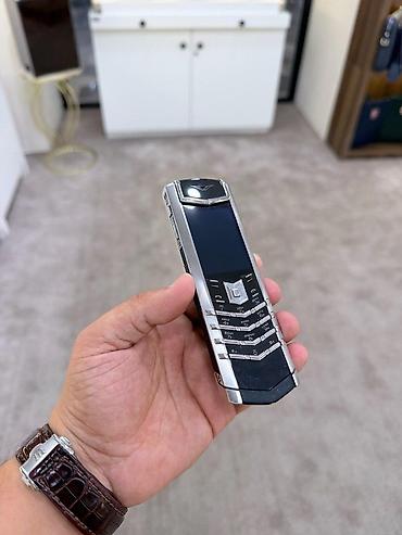 vertu phone: Vertu 4 GB, rəng - Gümüşü, Düyməli — 2