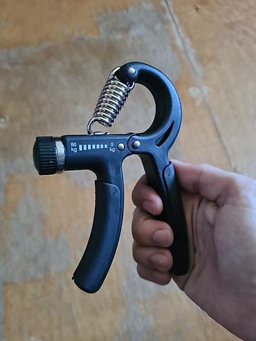 Espanderlər: Tənzimlənən əl üçün trenajor (hand gripper) - Güc diapazonu: 5–60 kq — 1