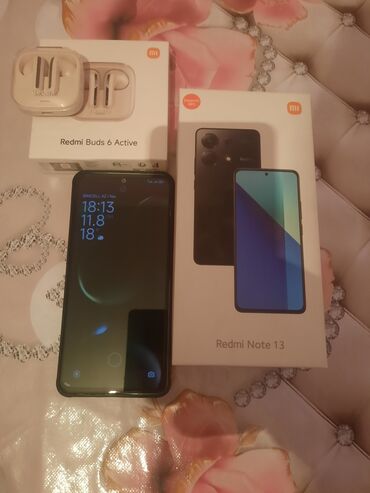 Mitsubishi: Xiaomi Redmi Note 13 smartfonu və Redmi Buds 6 Active qulaqlıqları