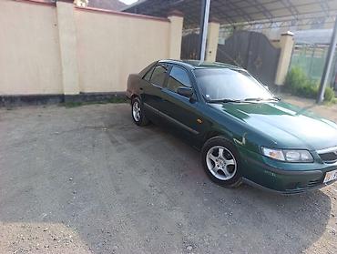 385 55: Mazda 626: 1999 г., 1.8 л, Механика, Бензин, Седан — 2
