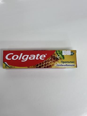 Colgate Прополис, отбеливающая зубная паста. Особенности: - С