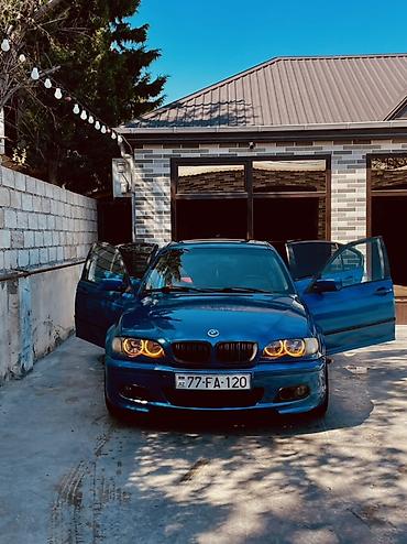 toyota corolla cross: BMW 3 series: 2.5 l | 1999 il Sedan — 1
