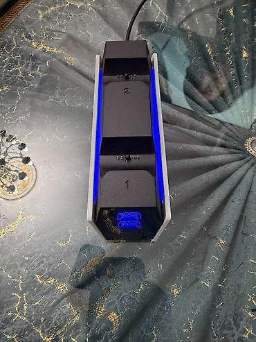 ps5 dualsense qiymeti: PS5 DualSense üçün iki yuvalı şarj stansiyası 2 ədəd var məndə biri — 4