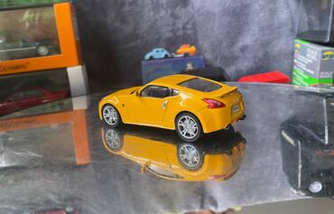 Avtomobil modelləri: Коллекционная модель Nissan 370Z Z34 yellow 2008 DeAgostini Scale — 8