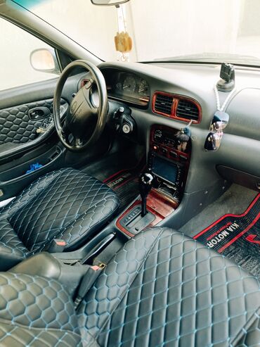 Kia: Kia Sephia sedan - Kuzov: 4 qapılı sedan, tünd yaşıl rəng - Ön hissə — 6