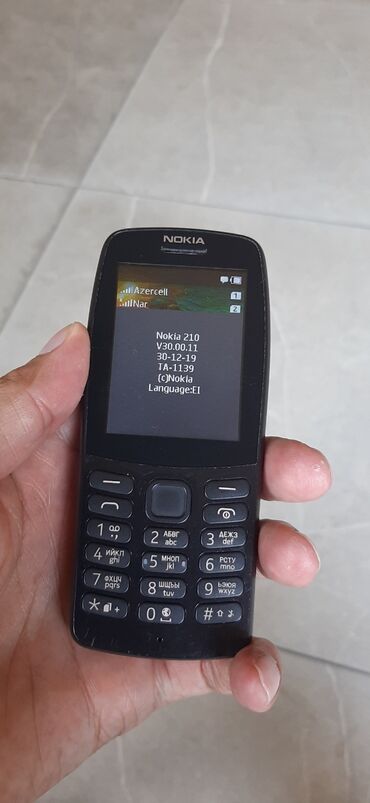 telefon gəncə: Nokia C210, 2 GB, rəng - Qara, İki sim kartlı