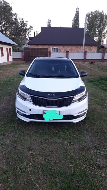 машина кейж: Kia Rio: 2015 г., 1.6 л, Автомат, Бензин, Седан