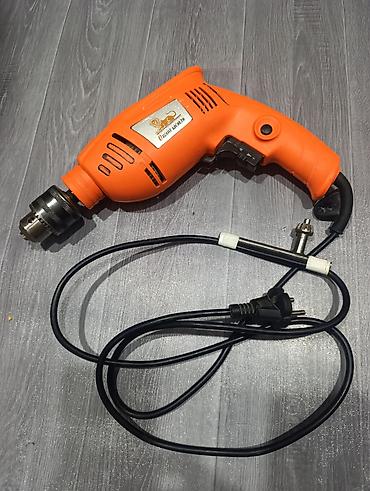 Zərbəli drellər: Drell Məhsul: Zərbəli elektrik matkap - Güc: 500 W - — 1