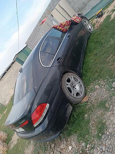 Салондун тетиктери: BMW 7 Series (E65/E66) — кожаный салон и интерьер - Просторный задний — 7