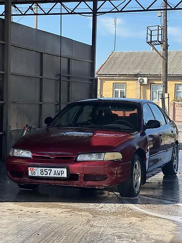 твикис диска: Mazda 626: 1997 г., 2 л, Автомат, Бензин, Седан — 5