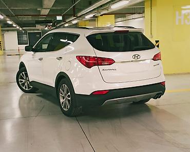 hyundai sonata 2011: Hunday Santa Fe 

2014 cü il
Amerikanka
2 turbo benzin
Ön çəkən 26700 — 8