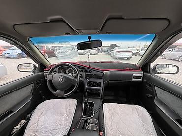 Унаа сатуу: Daewoo Nexia: 2013 г., 1.6 л, Кол менен иштөөчү, Бензин, Седан — 6