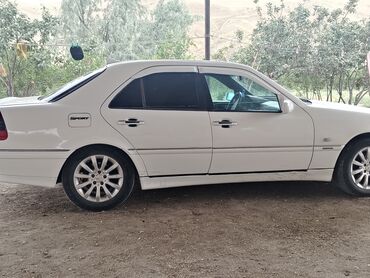 багажник на машину купить: Mercedes‑Benz C‑Sinif sedan (W202) – ağ rəng, 4 qapılı, arxaötürücülü