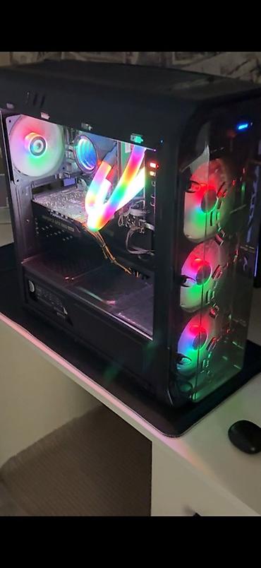 ноутбук с 1660 ti: RGB işıqlandırmalı masaüstü oyun kompüteri. Korpus qara rəngdədir və — 1