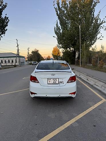 mazda 3 2004: Hyundai Solaris: 2015 г., 1.4 л, Механика, Бензин, Седан — 3