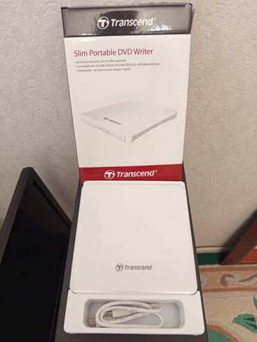 DVD плееры: Внешний оптический привод Transcend Slim Portable DVD Writer (белый)