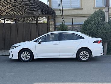 coroll: Toyota Corolla: 2021 г., 1.8 л, Автомат, Гибрид, Седан — 4